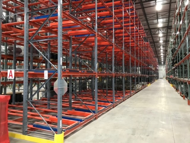 Warehouse shelving units arranged neatly