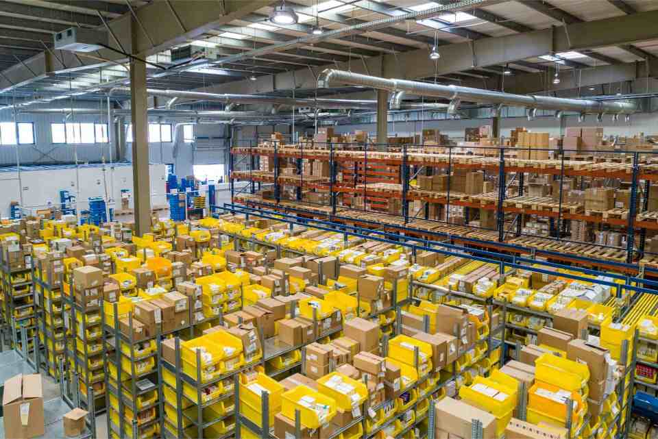 Warehouse with shelves filled with packaged goods