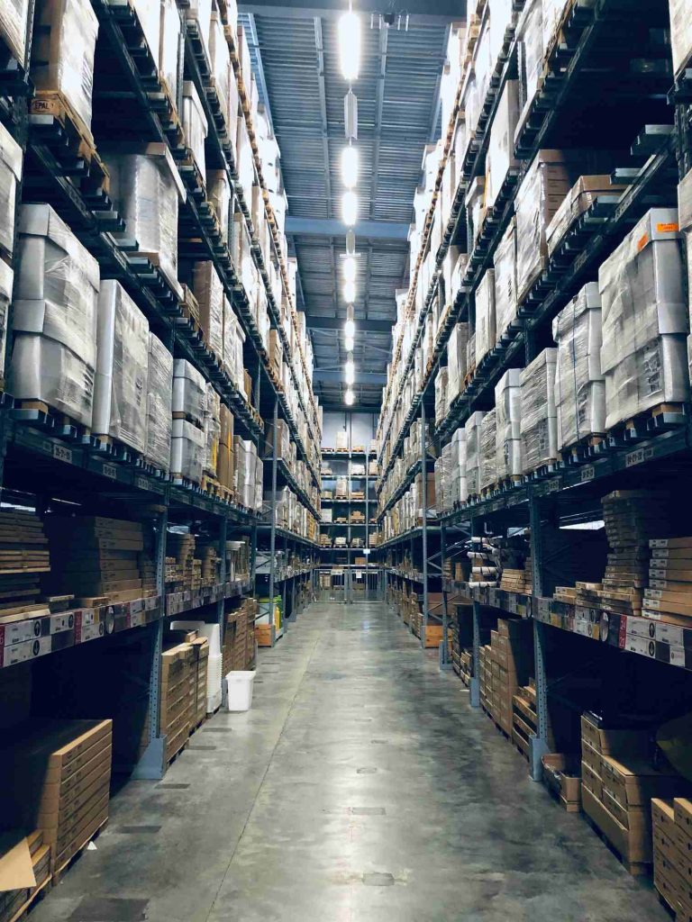 Warehouse aisle with stacked goods